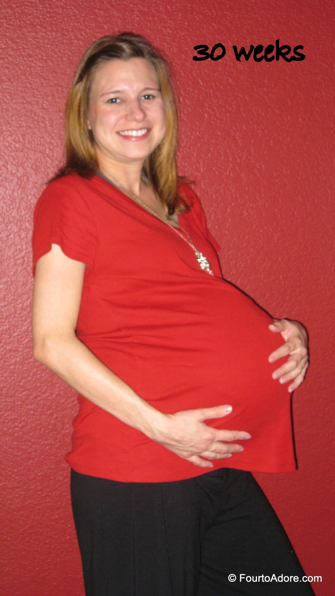 30 weeks turned out to be the final picture we would take. Mom and I thought it would be funny to take a picture against a red wall while I was wearing red. I didn't quite blend in to the background. 
