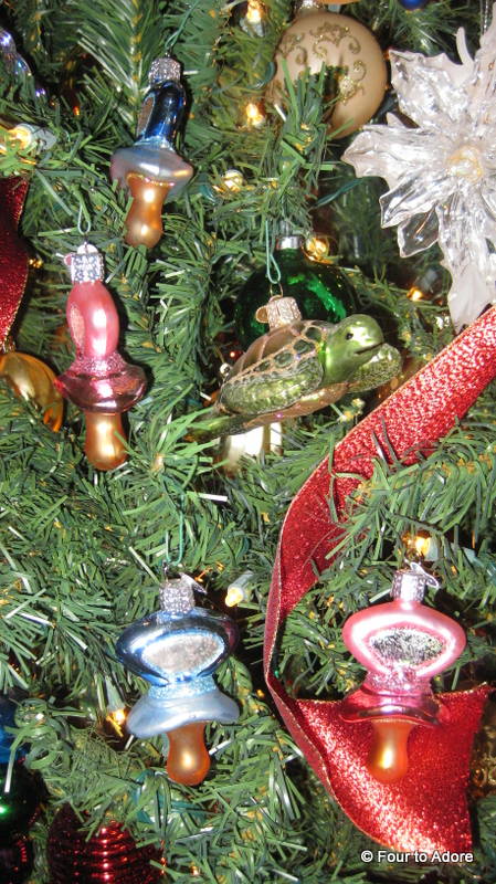 Here's my favorite collection of ornaments, four pacifiers and a sea turtle!