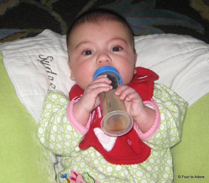 Rylin learned to hold her own juice bottle in the morning.