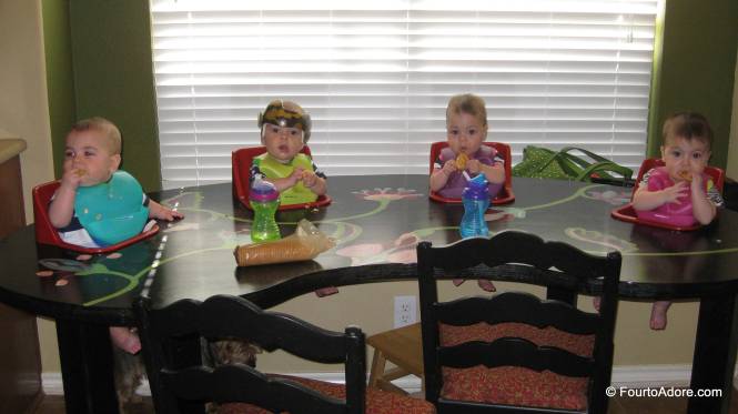 I totally snagged the idea of feeding the babies Ritz from Amber.  They LOVED them!  Funny thing, the boys crammed them in their mouths like Cookie Monster while the girls nibbled them like little ladies.