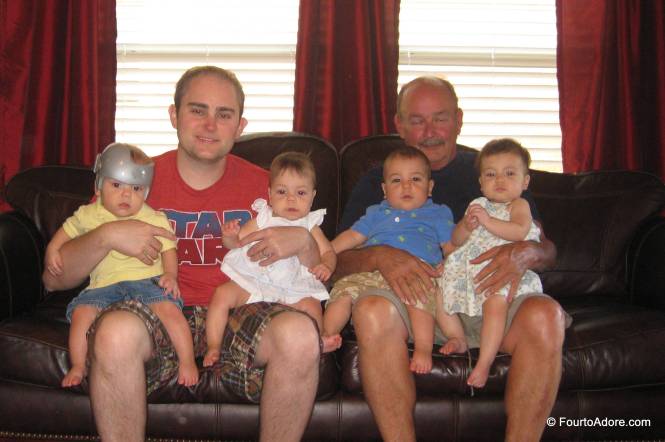 The Quadfather and Grandaddy managed to hold all the babies for a group photo opp.