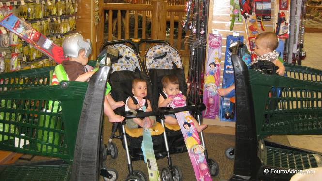 We stopped by the kid's fishing pole koisk for Grandpa.  He's been dreaming of taking the babies fishing since they were mere dots on a sonogram.  Notice, the girls have a Tinkerbell and Barbie pole while the boys have Cars and Spiderman.  There is something for everyone!