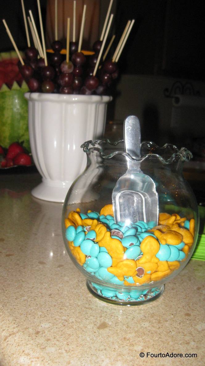 I filled a beta bowl with goldfish crackers and blue M & M's.  We skewered grapes and put them in a vase.