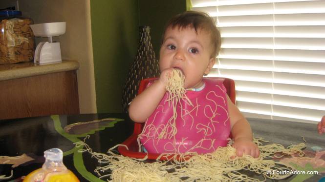 Rylin tackled spaghetti with reckless abandon!