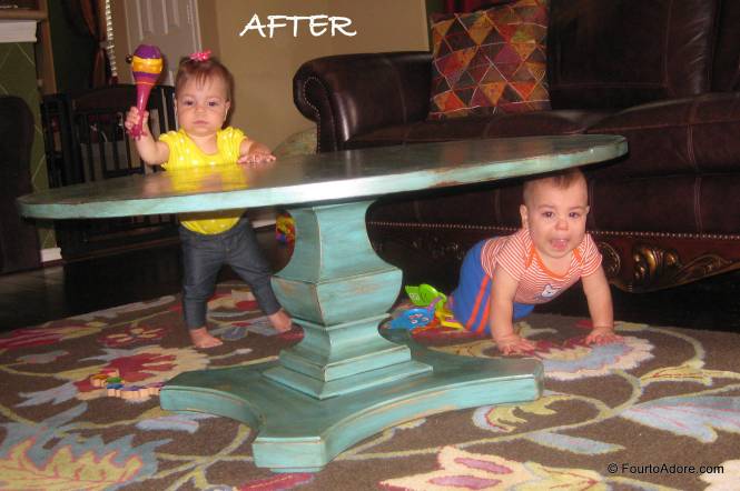 As soon as the table was complete and returned to it's rightful place in the den, Sydney began adding to the distressed finish with a maraca.