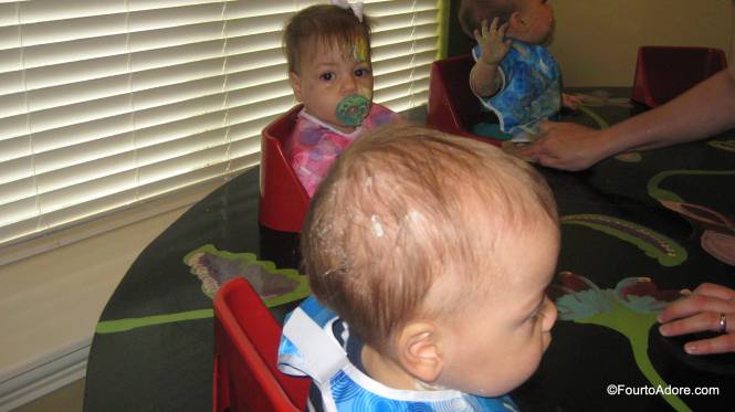 Mason rubbed a little paint on the back of his hair while Sydney did some forehead painting.