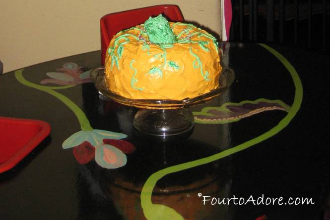 When I was a kid, mom always made a pumpkin shaped cake of two bundt cakes.  She made it once again for the quads.  