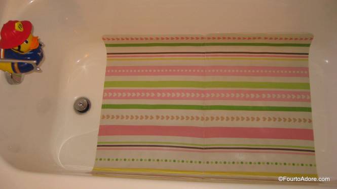What appears to be an oversize bathmat, is actually two identical bathmats.