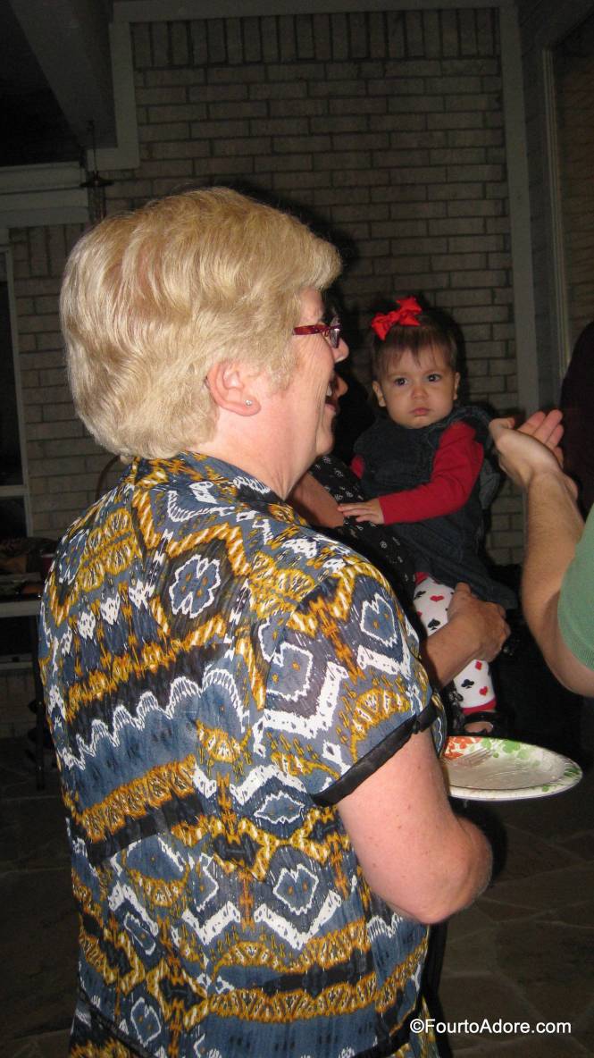 Whenever we go places with Nisey and Grandpa, Rylin seems to gravitate to Nisey who consoles her stranger danger.  Somehow Rylin ended up greeting an unfamiliar guest AND she stayed with the guest for quite a while.  When she spotted me, she gave the stink eye to her new found friend.  