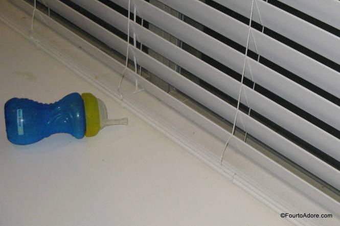 The window seat behind the quad table catches many things they toss, especially cups.
