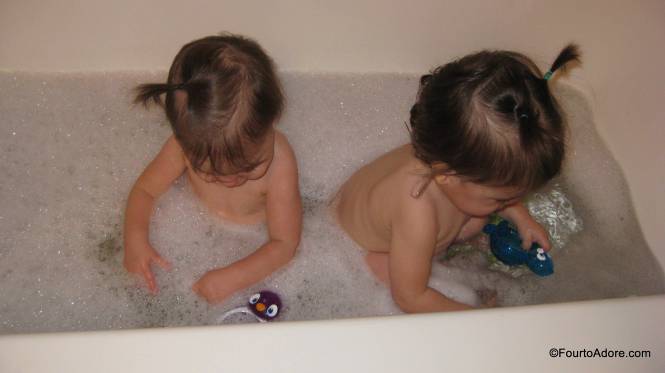 The quads really enjoyed running their hands and fingers through the bubbles.