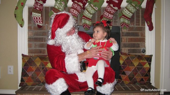 Rylin was the only one hesitant to sit on Santa's lap.  A cookie did the trick.