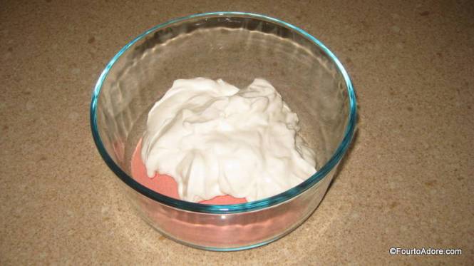 Mix the yogurt and Jell-O in a microwave safe bowl