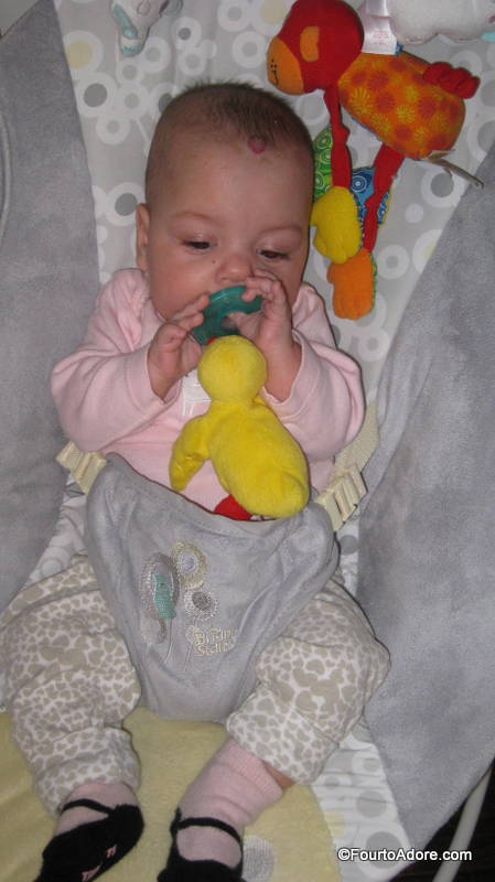 Sydney fell in love with her Wubbanub in the NICU, and   continued to love it after she came home.