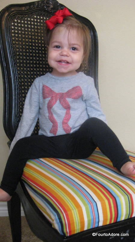 Sydney rarely smiles, revealing her teeth.  I snapped this on her 18 month birthday.