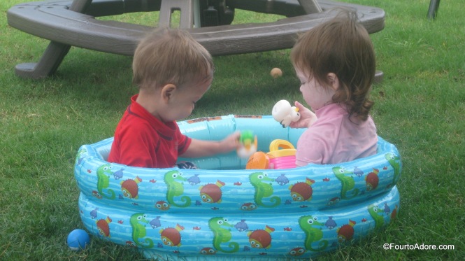 Mason and Trystan cozied up in the mini pool.  