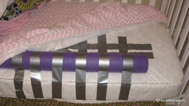 duct tape a pool noodle to the mattress of a toddler bed to help prevent your child from rolling out