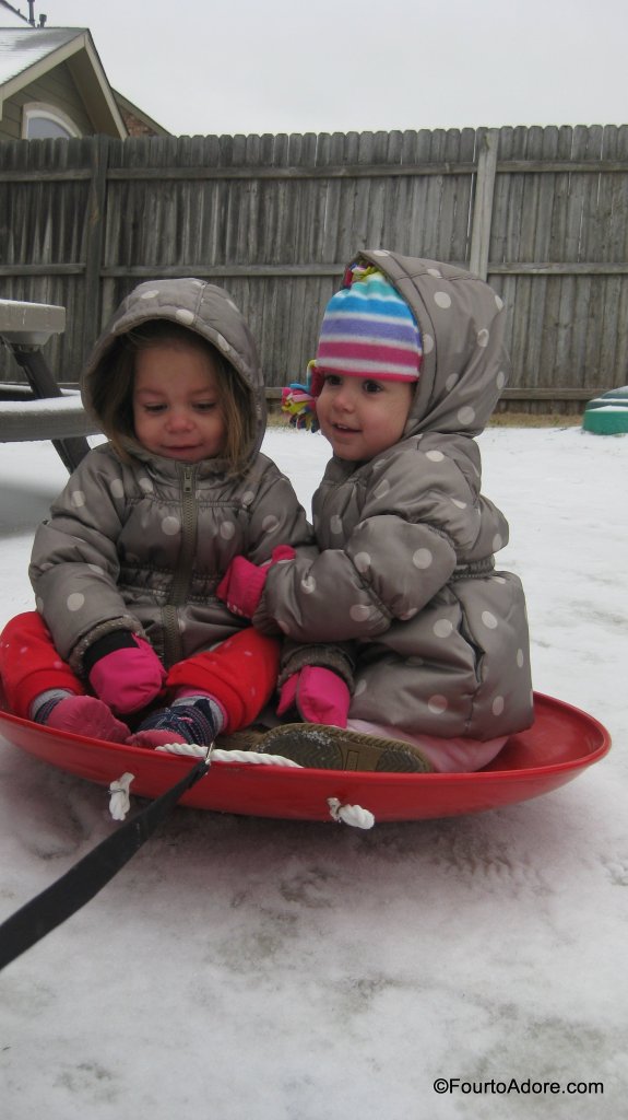 girls sledding 