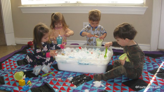 If you don't want to bundle up to enjoy the snow, bring a tub inside for sensory play.